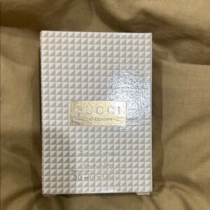 NWOT Gucci Travel Spray Box in White with Gold Accents.